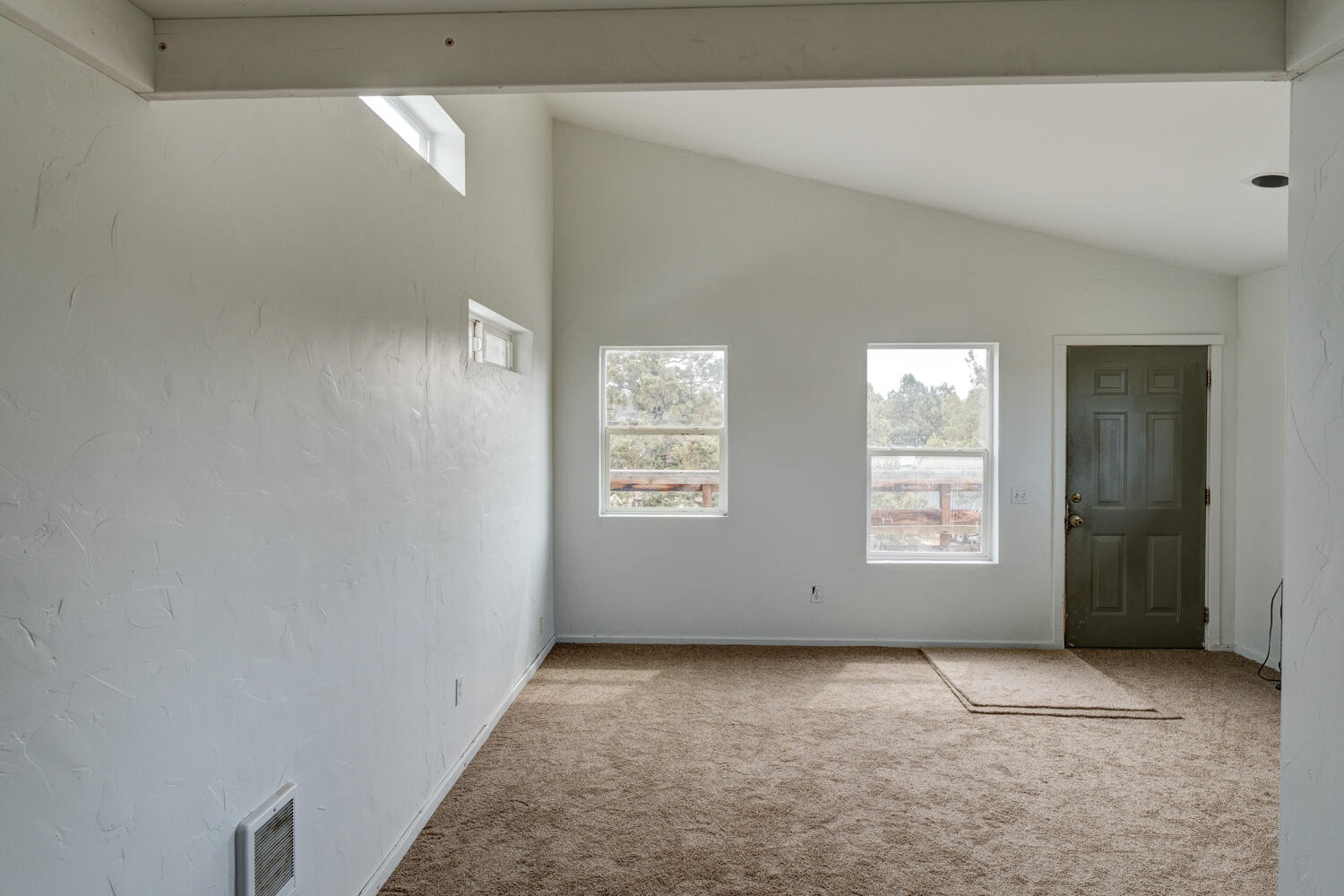 64925 McGrath Road Bend, OR 97701 - Photo 43 of 51 Tons of light and vaulted ceiling make this cozy apartment a joy to live in