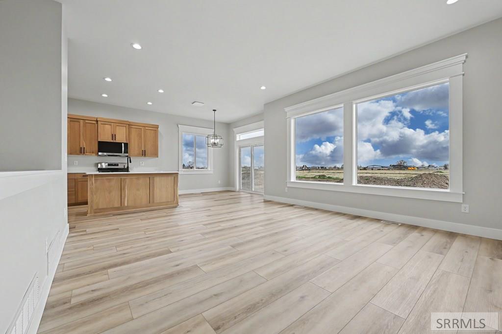 456 Spruce Way Rigby, ID 83442 - Photo 2 of 24 Great Room to Kitchen/Dining Area