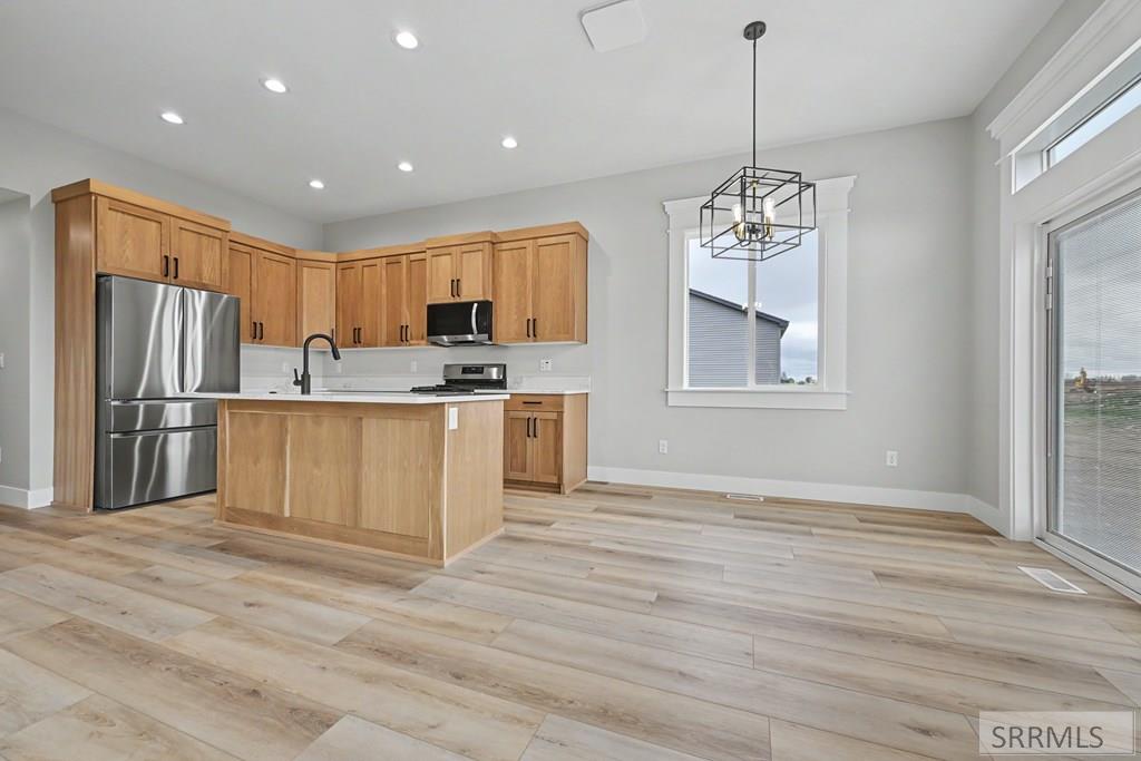 456 Spruce Way Rigby, ID 83442 - Photo 3 of 24 Kitchen/Dining Area