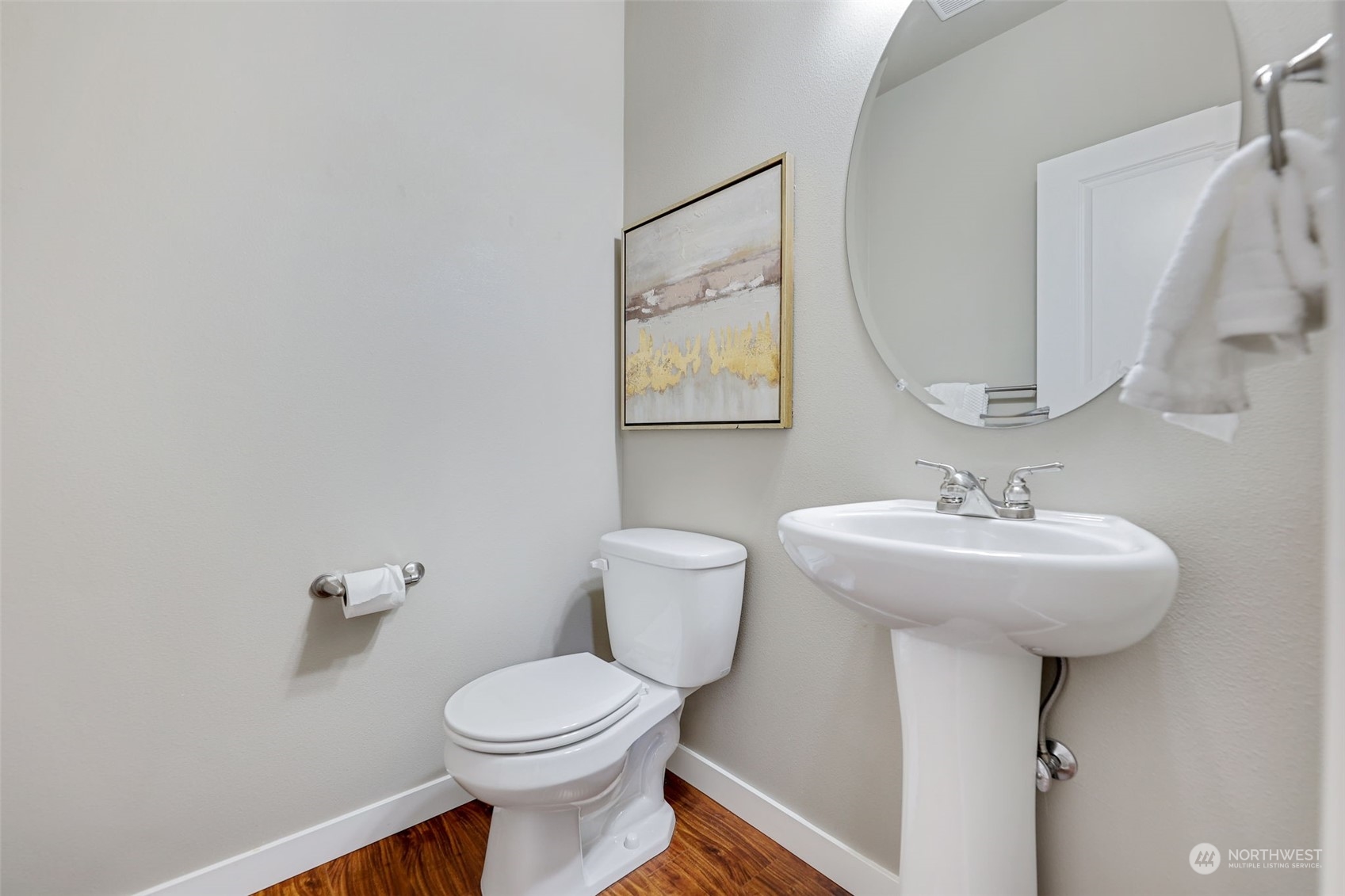 1102 120th Street Southeast Everett, WA 98208 - Photo 12 of 28 a bathroom with a sink mirror and toilet