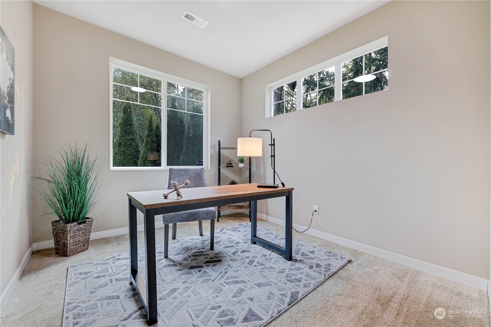 1102 120th Street Southeast Everett, WA 98208 - Photo 6 of 28 a view of a workspace with furniture