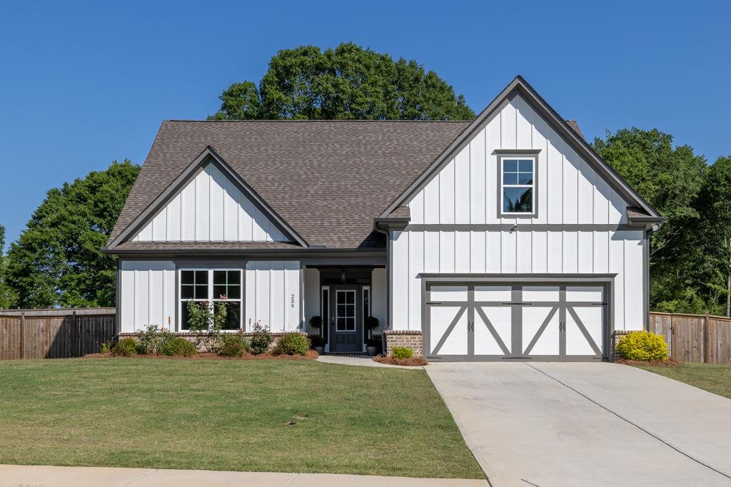259 Dunagan Court Winder, GA 30680 - Photo 1 of 1 a view of a house with backyard and garden