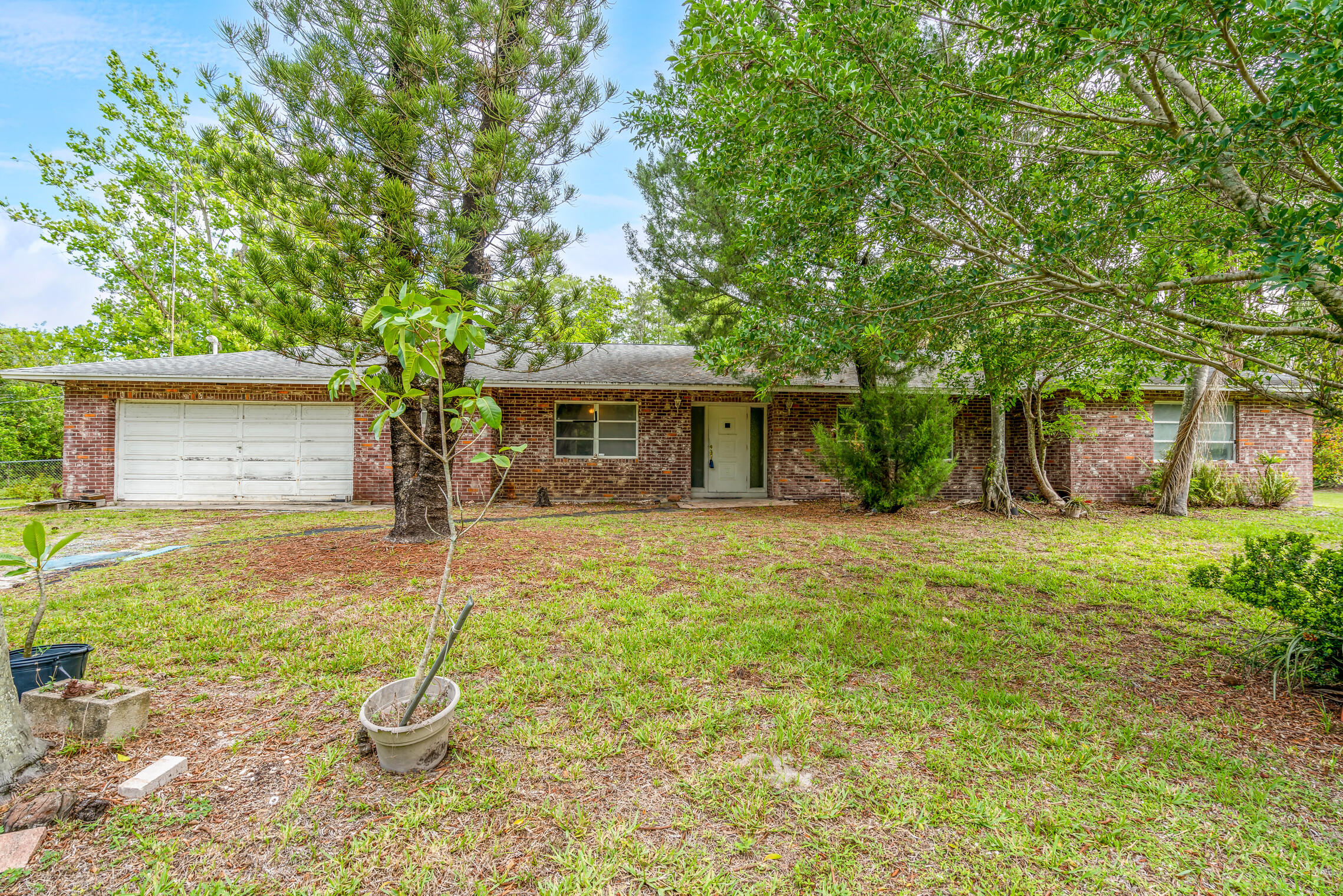 15707 Collecting Canal Road Loxahatchee Groves, FL 33470 - Photo 1 of 30 Front