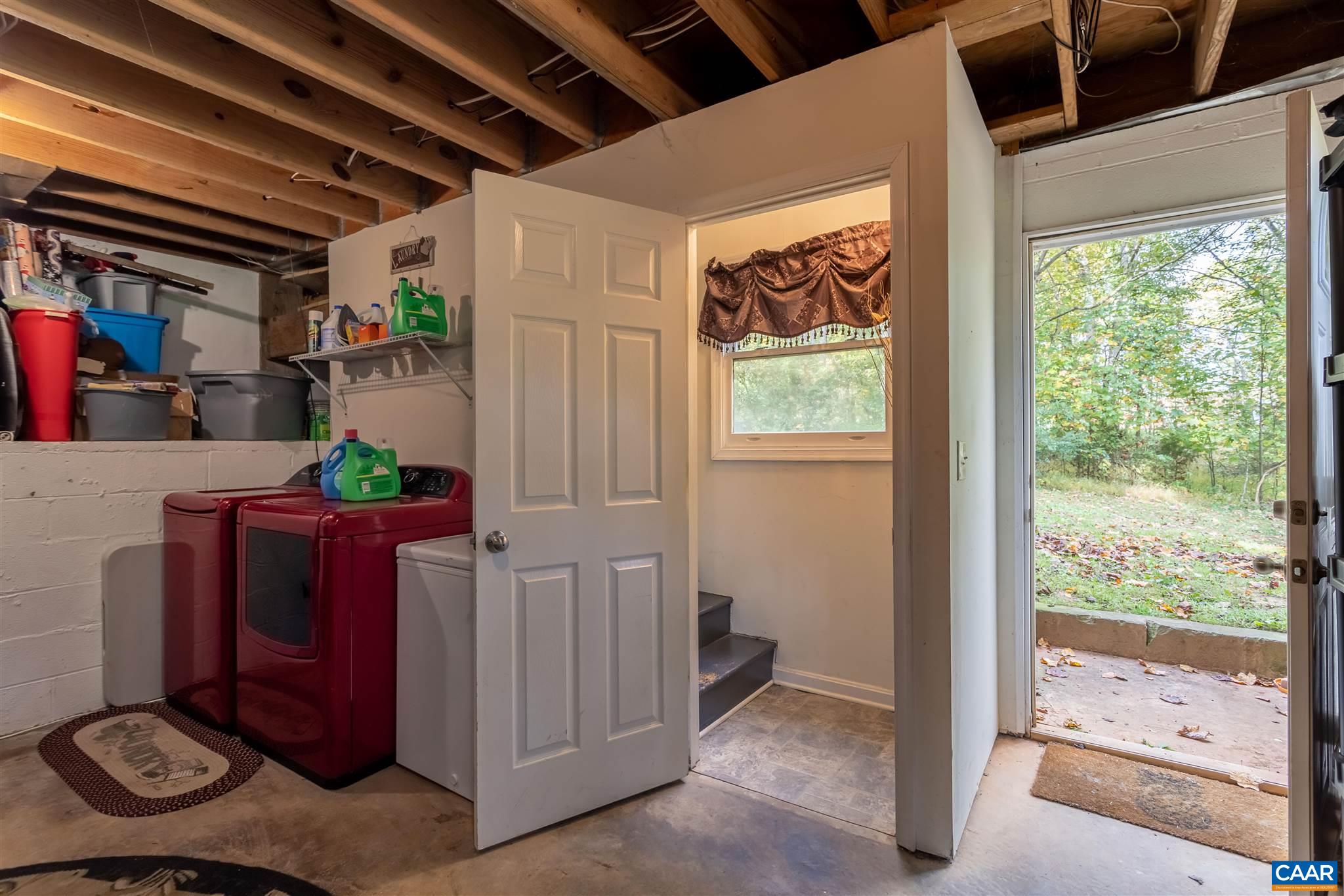 2588 South Blue Ridge Turnpike Rochelle, VA 22738 - Photo 20 of 30 a living room with furniture and a window
