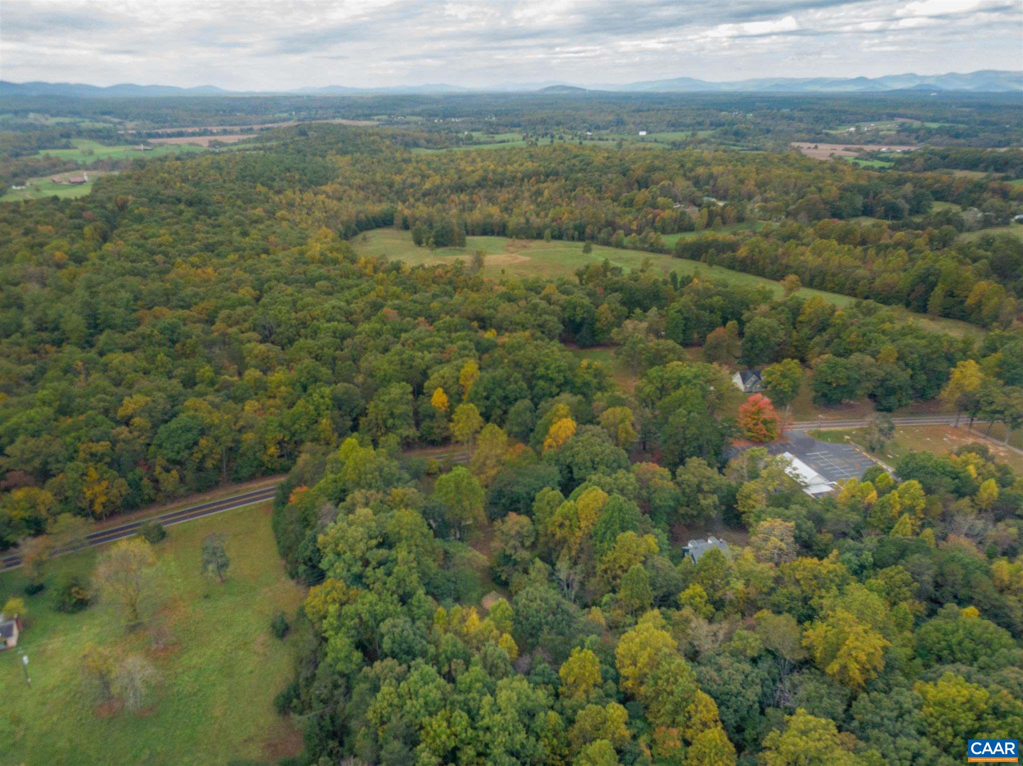 2588 South Blue Ridge Turnpike Rochelle, VA 22738 - Photo 28 of 30 a view of a city with lush green forest