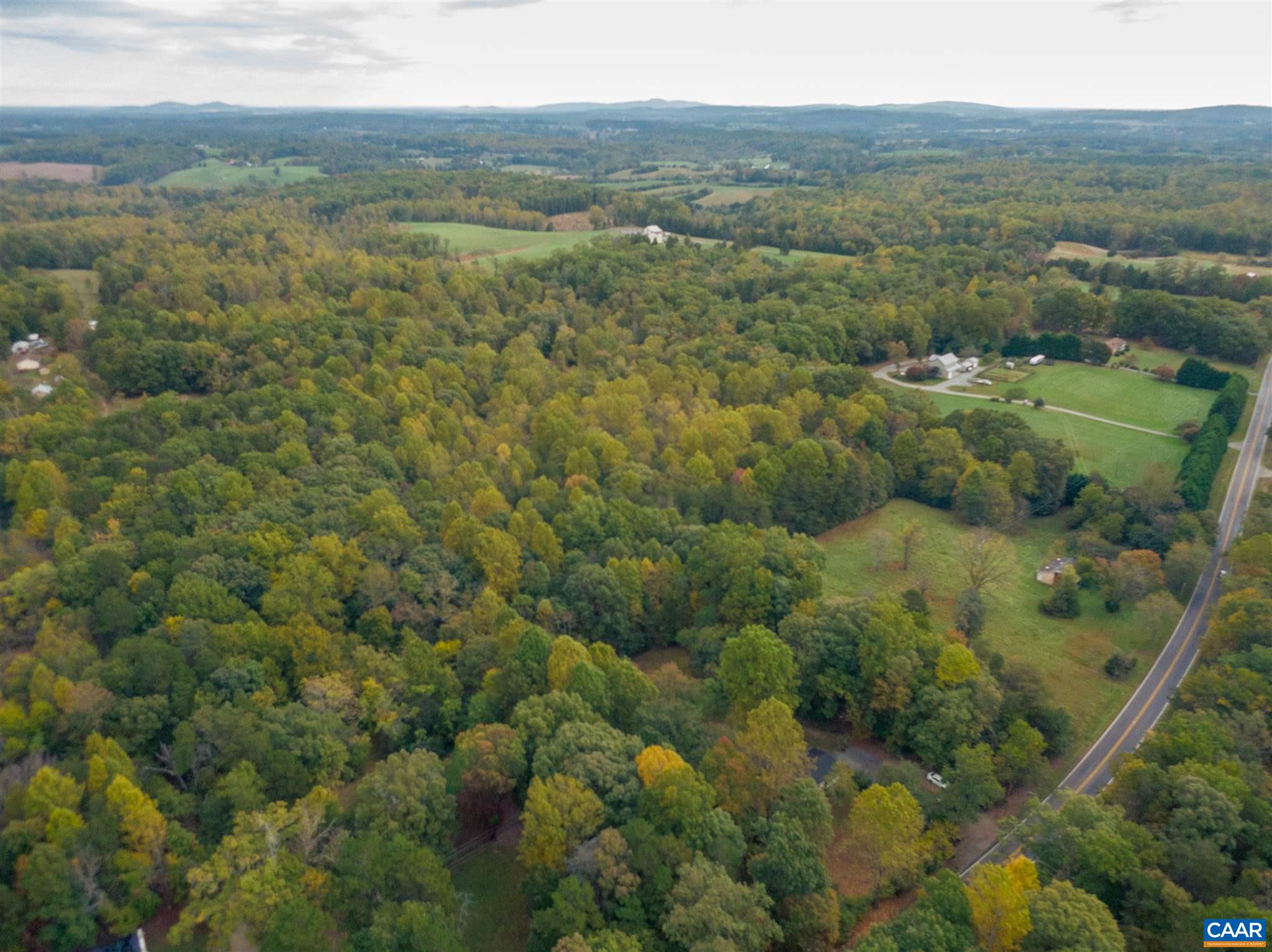 2588 South Blue Ridge Turnpike Rochelle, VA 22738 - Photo 29 of 30 an aerial view of residential houses with outdoor space and trees