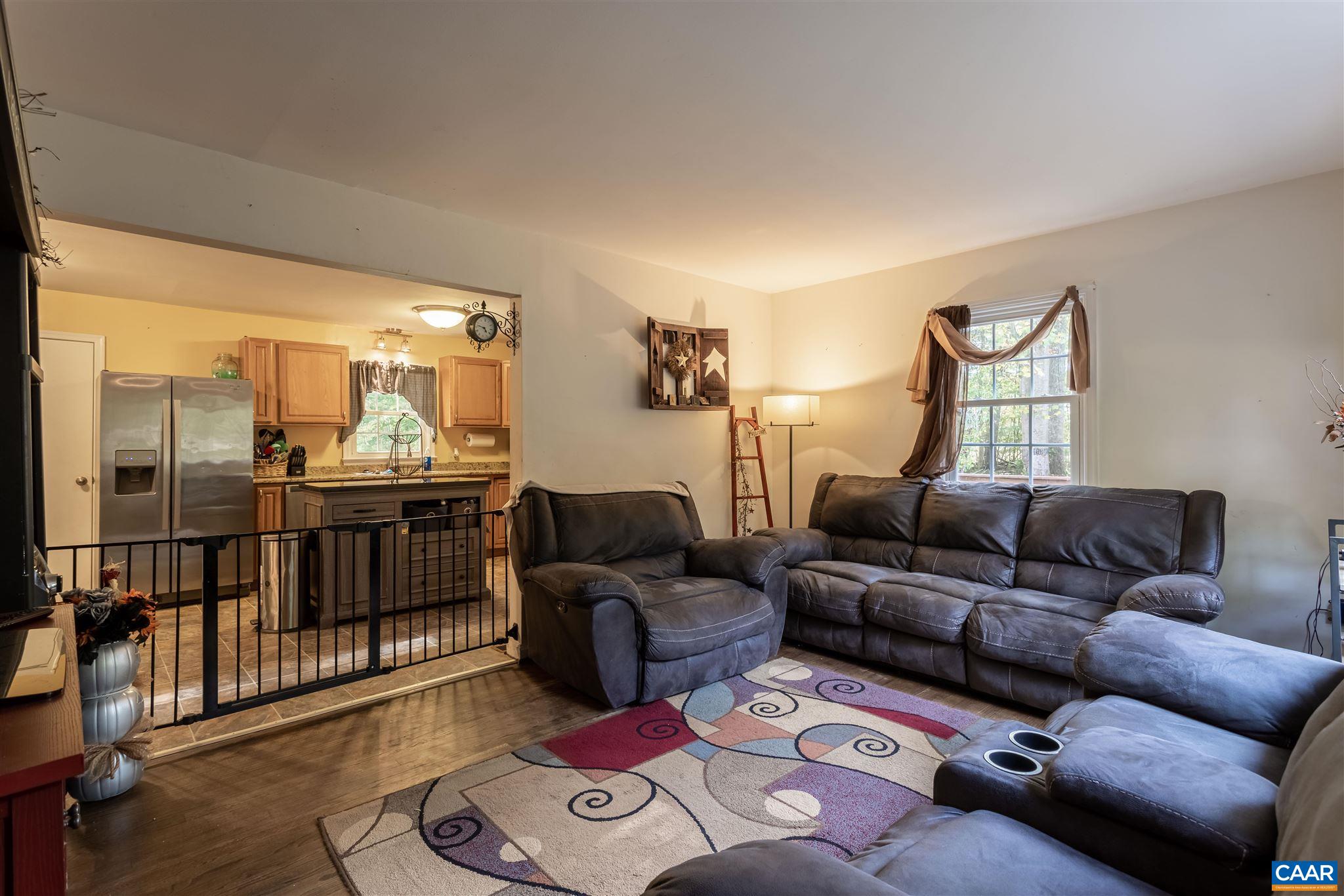 2588 South Blue Ridge Turnpike Rochelle, VA 22738 - Photo 6 of 30 a living room with furniture and wooden floor