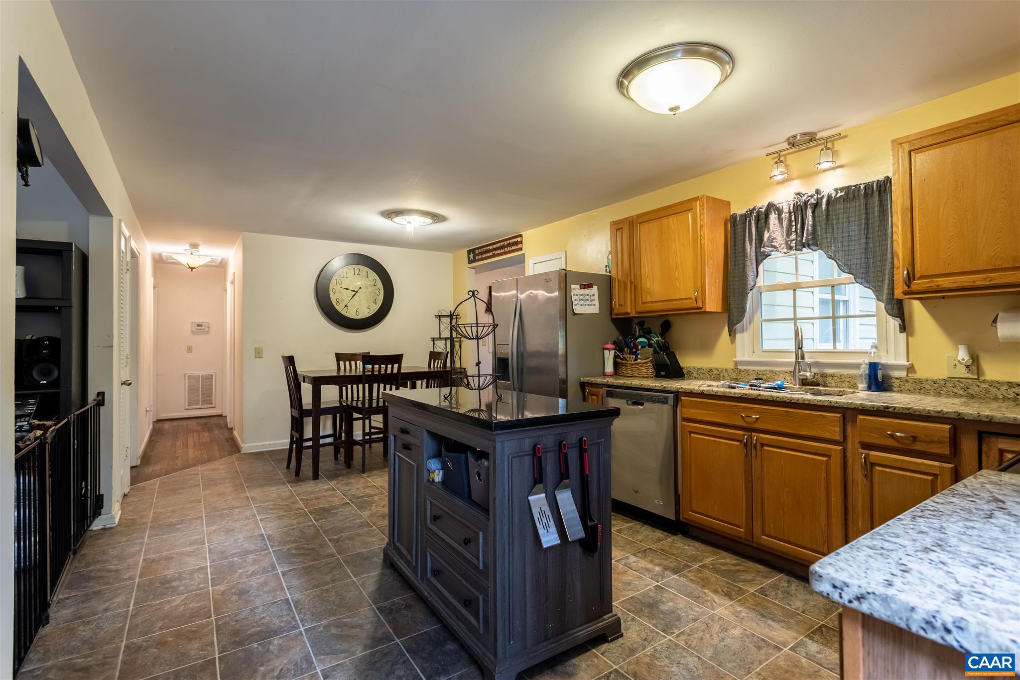 2588 South Blue Ridge Turnpike Rochelle, VA 22738 - Photo 9 of 30 a kitchen with granite countertop a sink stainless steel appliances and cabinets
