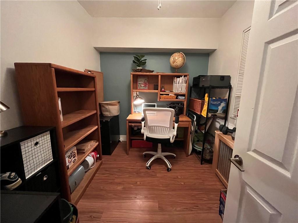 1716 Snow Way Pittsburgh, PA 15206 - Photo 19 of 21 a view of a workspace with furniture and gym equipment