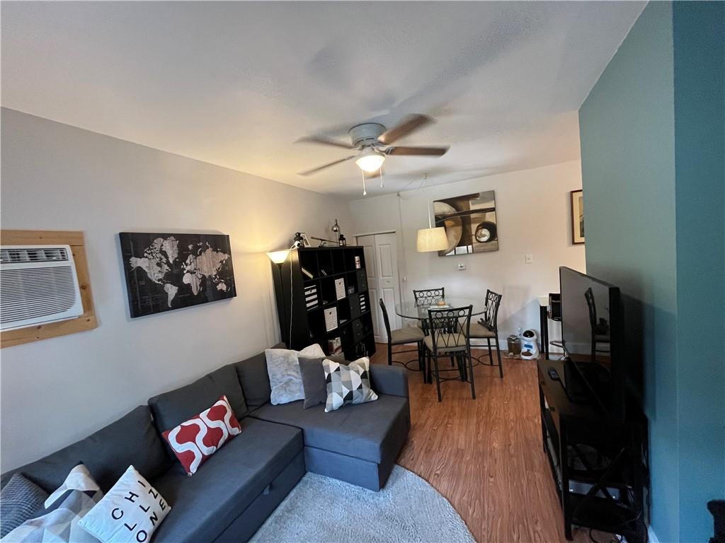1716 Snow Way Pittsburgh, PA 15206 - Photo 2 of 21 a living room with furniture and wooden floor