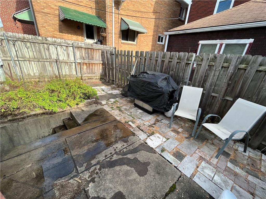 1716 Snow Way Pittsburgh, PA 15206 - Photo 21 of 21 a view of backyard with a patio