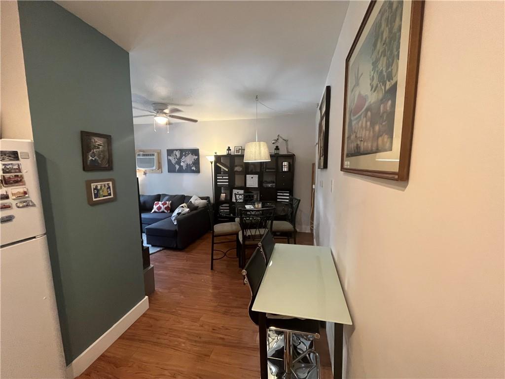 1716 Snow Way Pittsburgh, PA 15206 - Photo 8 of 21 a living room with furniture and wooden floor