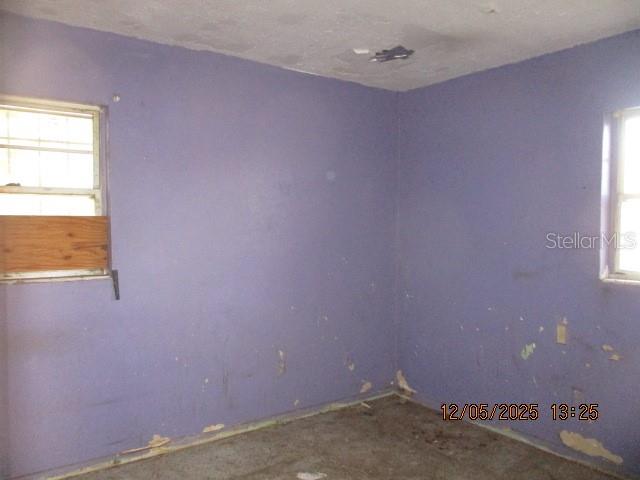 4175 Covington Street Orlando, FL 32811 - Photo 13 of 19 an empty room with a window