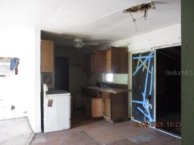 4175 Covington Street Orlando, FL 32811 - Photo 8 of 19 a view of a storage & utility room