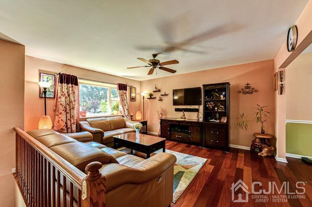 74 Briar Avenue Edison, NJ 08817 - Photo 12 of 30 a living room with furniture and a flat screen tv