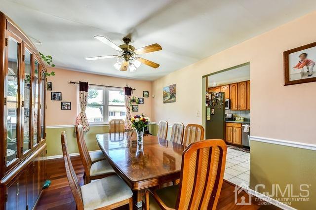 74 Briar Avenue Edison, NJ 08817 - Photo 13 of 30 a view of a dining room with furniture window and wooden floor