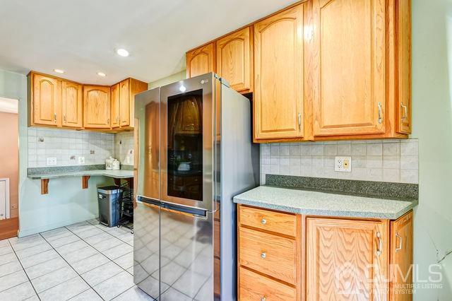 74 Briar Avenue Edison, NJ 08817 - Photo 16 of 30 a kitchen with stainless steel appliances granite countertop a refrigerator and a sink