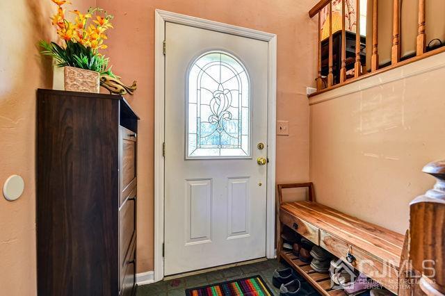 74 Briar Avenue Edison, NJ 08817 - Photo 9 of 30 a view of an entryway with wooden floor