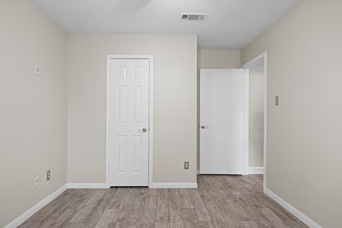 1511 Quail Run Road Pflugerville, TX 78660 - Photo 17 of 27 a view of an empty room