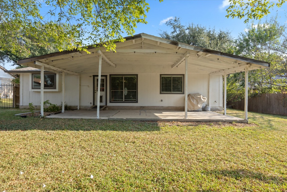 1511 Quail Run Road Pflugerville, TX 78660 - Photo 27 of 27 a view of a house with backyard and sitting area