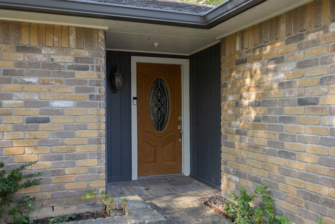 1511 Quail Run Road Pflugerville, TX 78660 - Photo 3 of 27 a front view of a house with shower