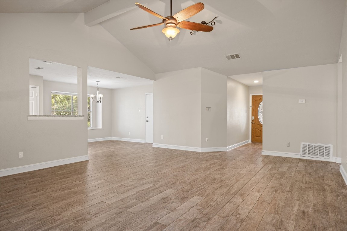 1511 Quail Run Road Pflugerville, TX 78660 - Photo 8 of 27 a view of an empty room with a window