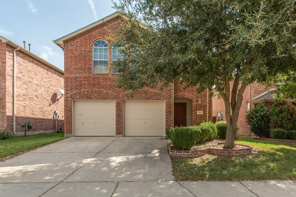 2005 Reston Drive McKinney, TX 75072 - Photo 1 of 1 a front view of a house with a yard and garage