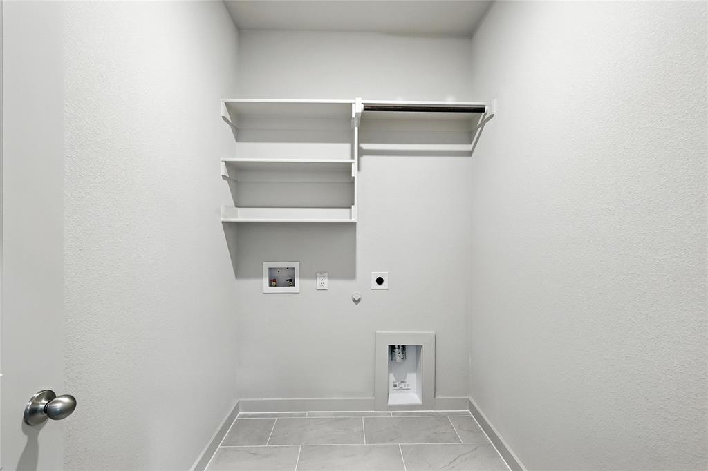 2623 Stowers Street Anna, TX 75409 - Photo 20 of 36 a view of an empty walk in closet