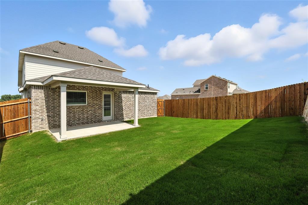 2623 Stowers Street Anna, TX 75409 - Photo 23 of 36 a front view of a house with garden