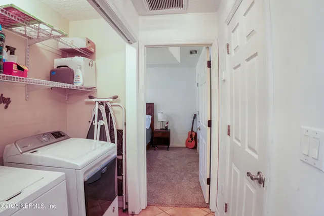 a kitchen with stainless steel appliances granite countertop a refrigerator sink and cabinets