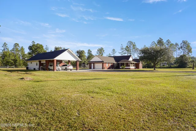a front view of house with an outdoor space and seating