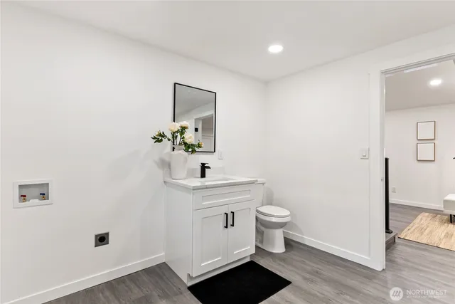 a bathroom with a sink and a toilet