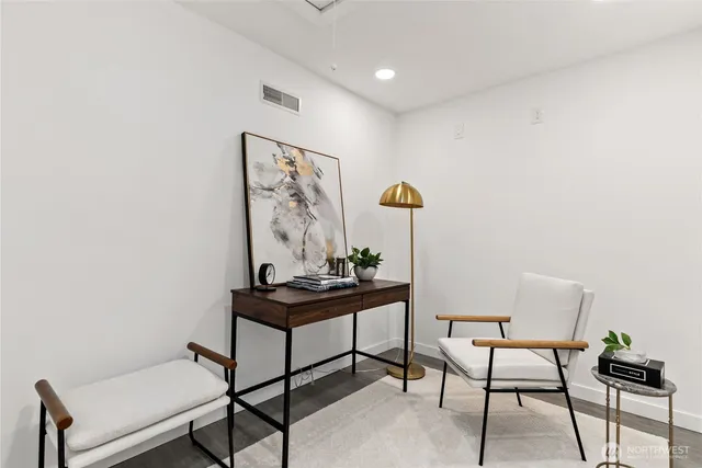 a view of a livingroom with furniture and a couch