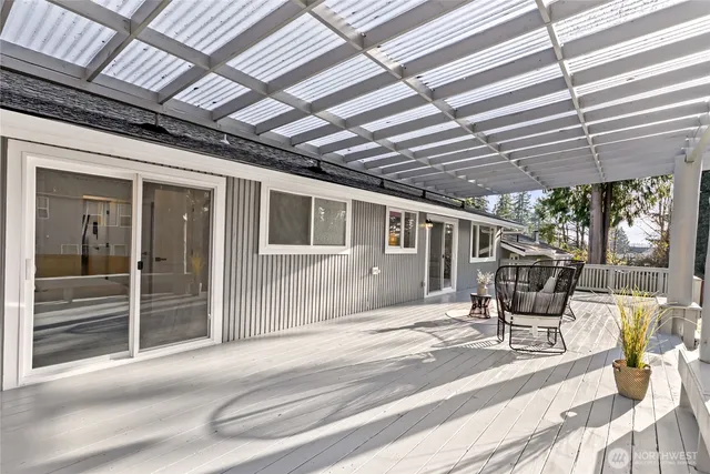 a patio with table and chairs