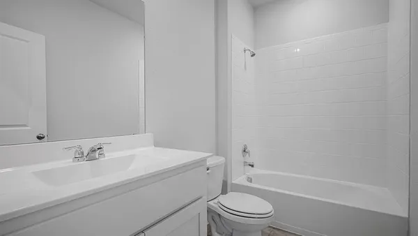 a bathroom with a sink toilet and bathtub
