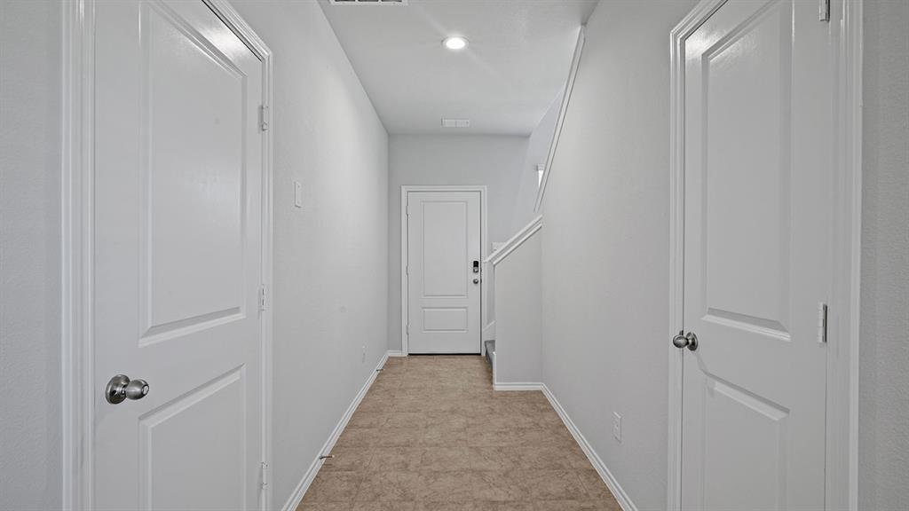 114 Mojave Road Boyd, TX 76023 - Photo 30 of 35 a view of a hallway with wooden floor and closet