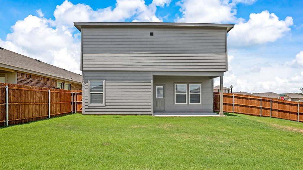 114 Mojave Road Boyd, TX 76023 - Photo 31 of 35 a front view of a house with garden