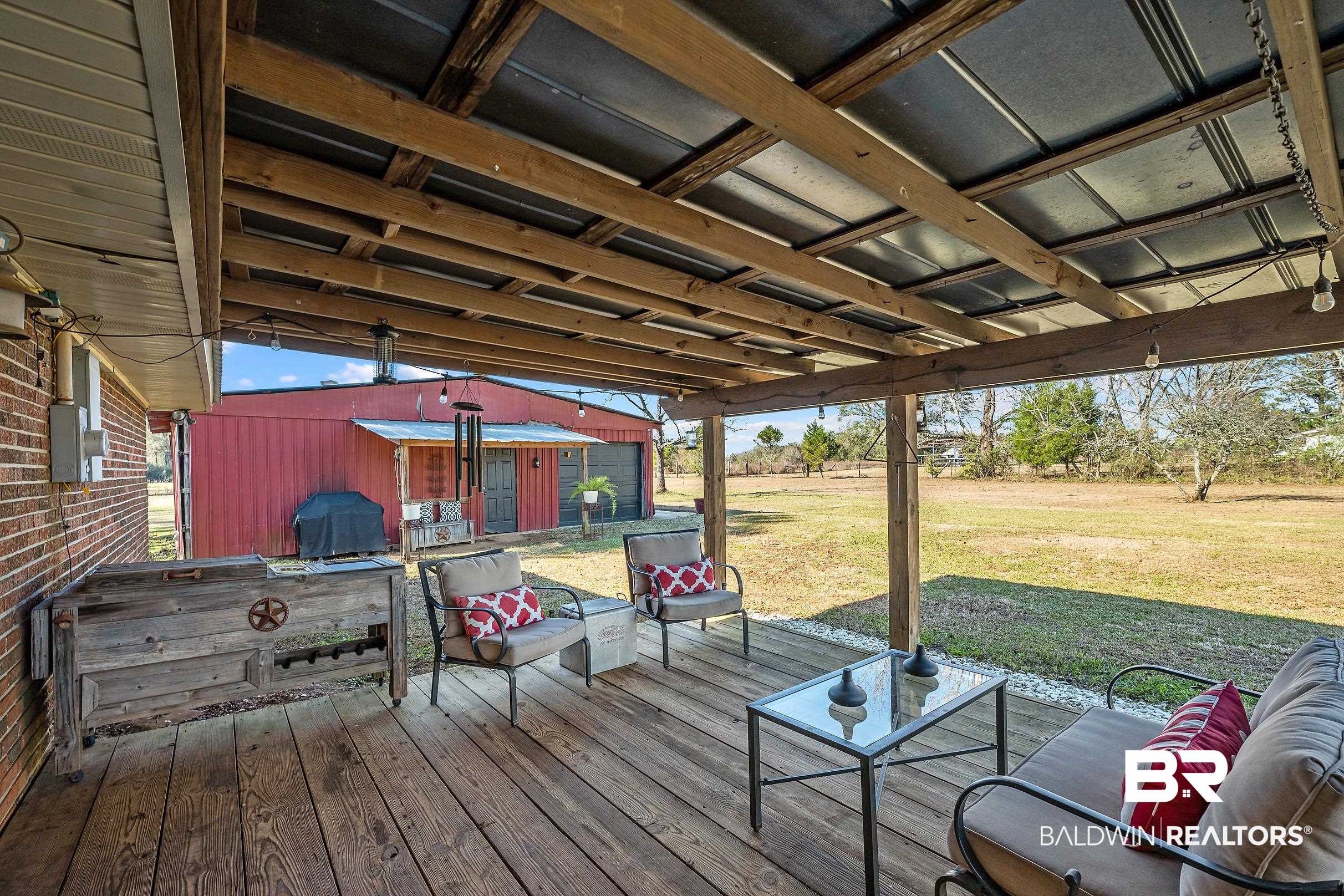 110 Sam Jones Road Atmore, AL 36502 - Photo 27 of 47 Deck with a yard and area for grilling