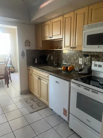 a room with furniture and a window