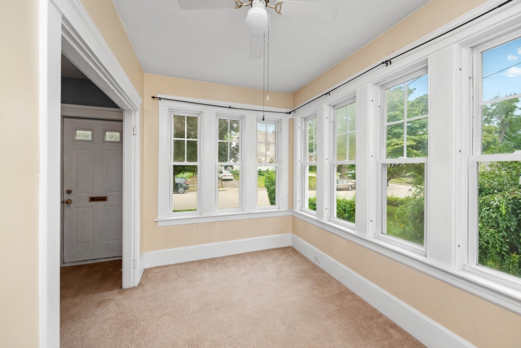 90 Meadow Road Woonsocket, RI 02895 - Photo 4 of 18 a view of an empty room with a window