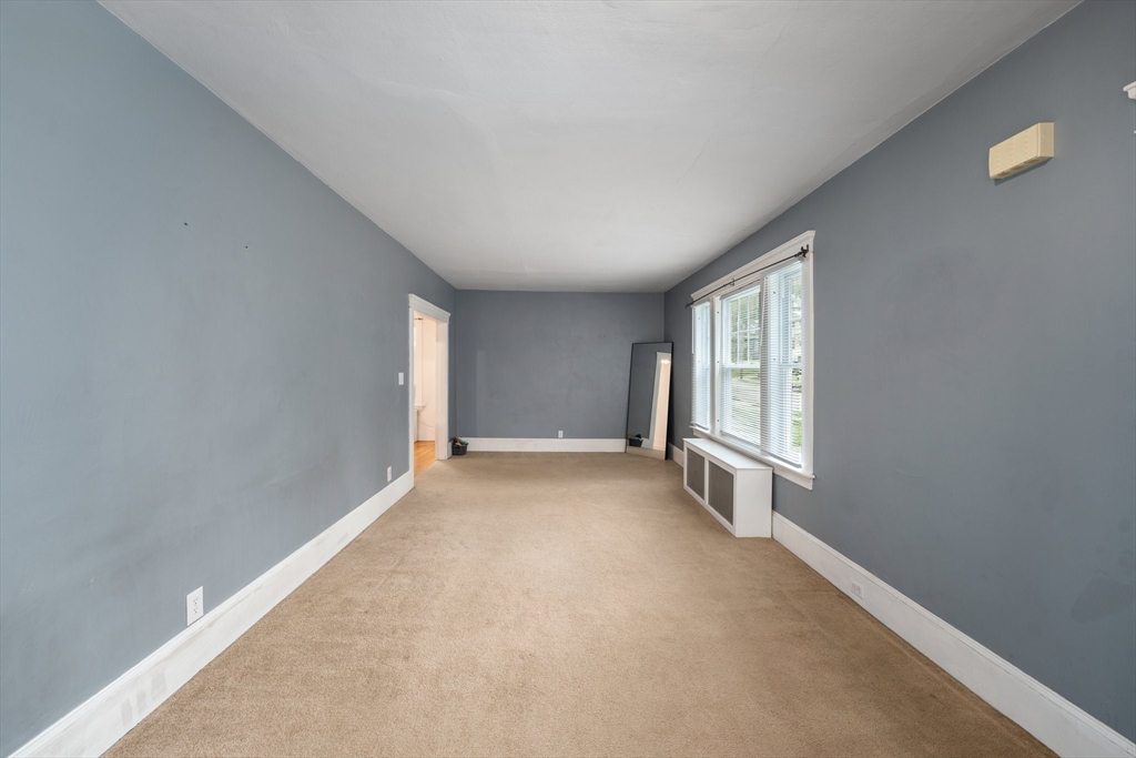 90 Meadow Road Woonsocket, RI 02895 - Photo 5 of 18 an empty room with windows