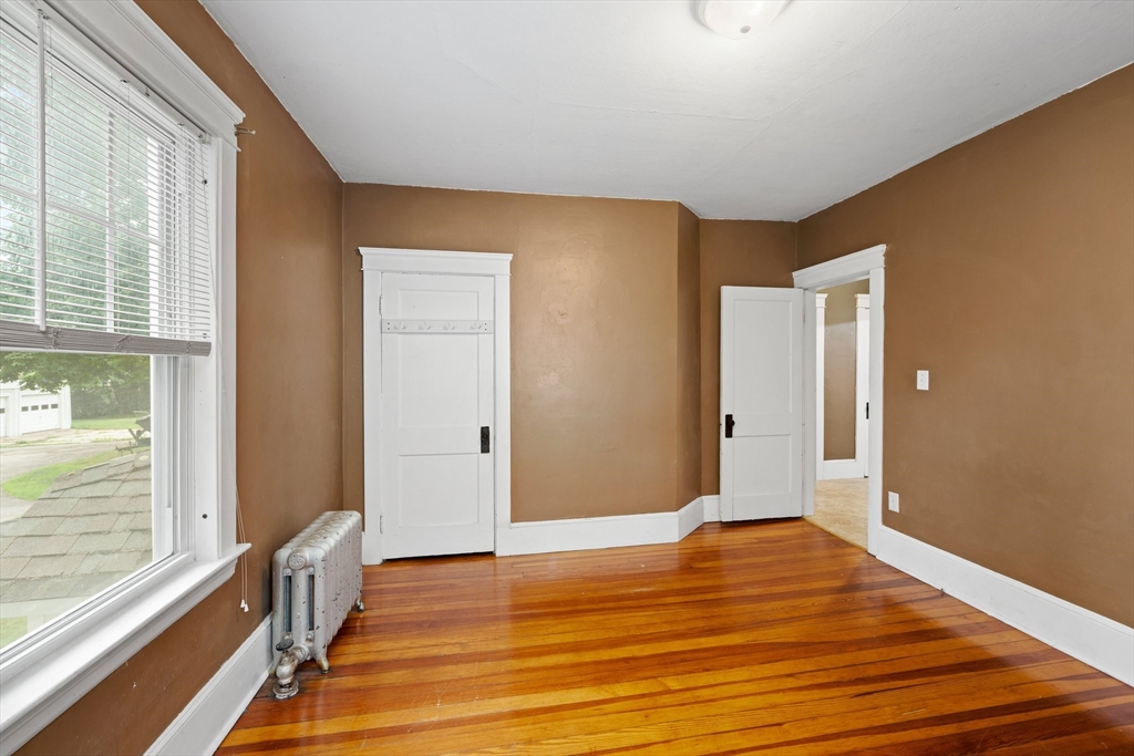 90 Meadow Road Woonsocket, RI 02895 - Photo 6 of 18 a view of a room with wooden floor and windows
