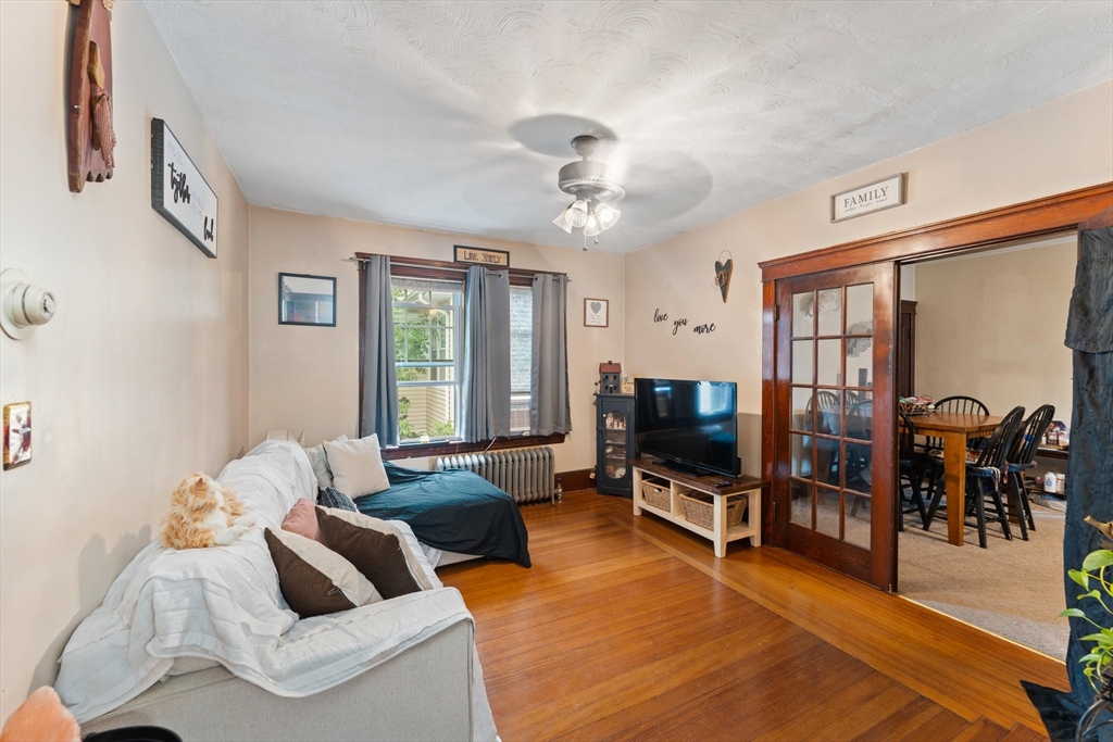 90 Meadow Road Woonsocket, RI 02895 - Photo 10 of 18 a living room with furniture and a flat screen tv