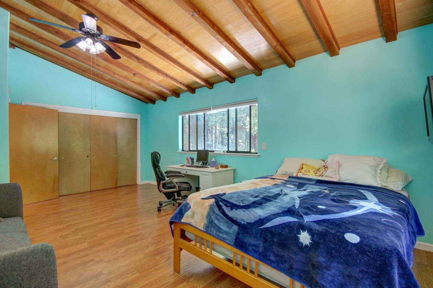 500 Hidden Canyon Watsonville, CA 95076 - Photo 12 of 37 a bedroom with a bed and furniture