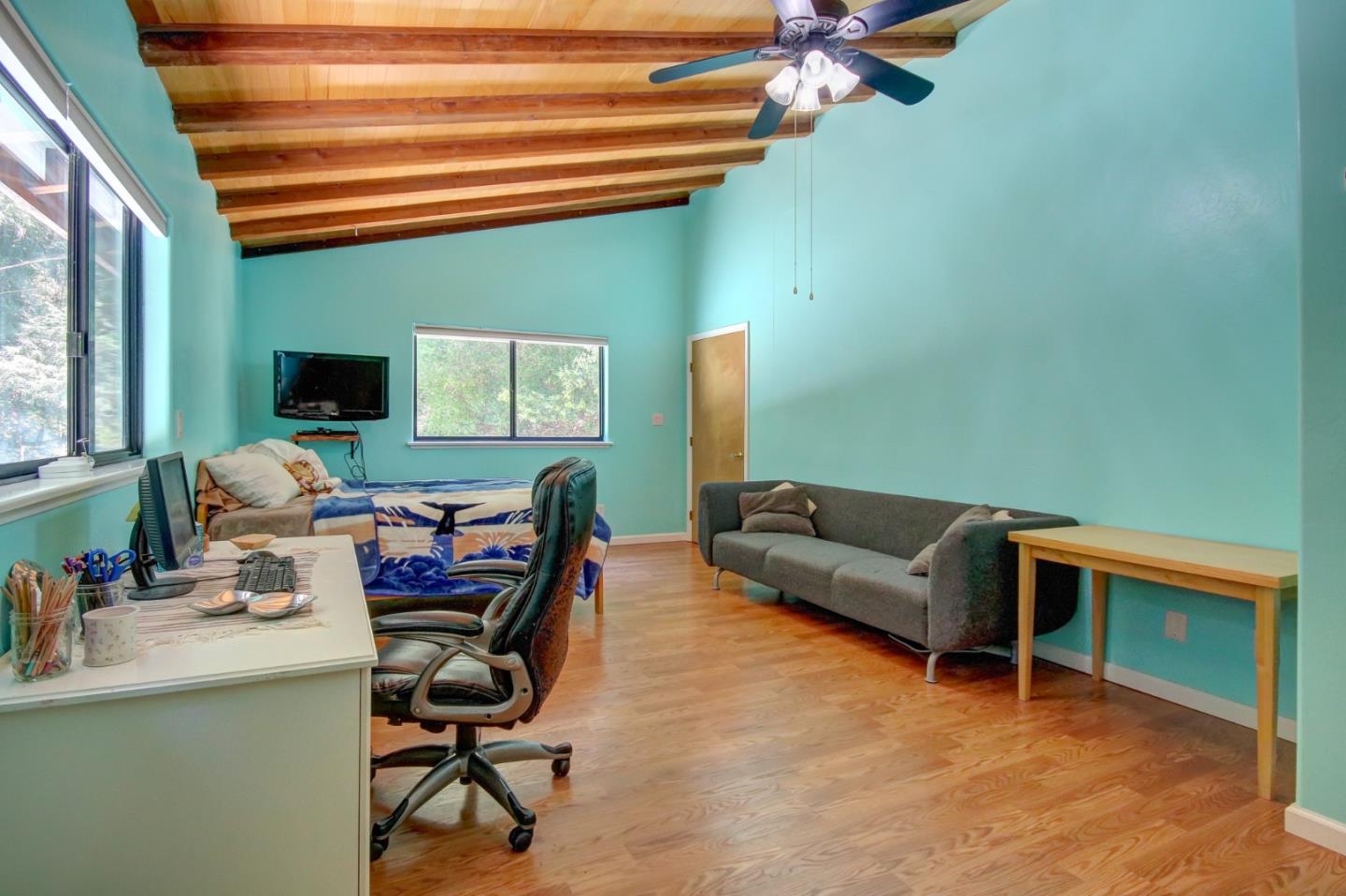 500 Hidden Canyon Watsonville, CA 95076 - Photo 15 of 37 a living room with furniture and a flat screen tv