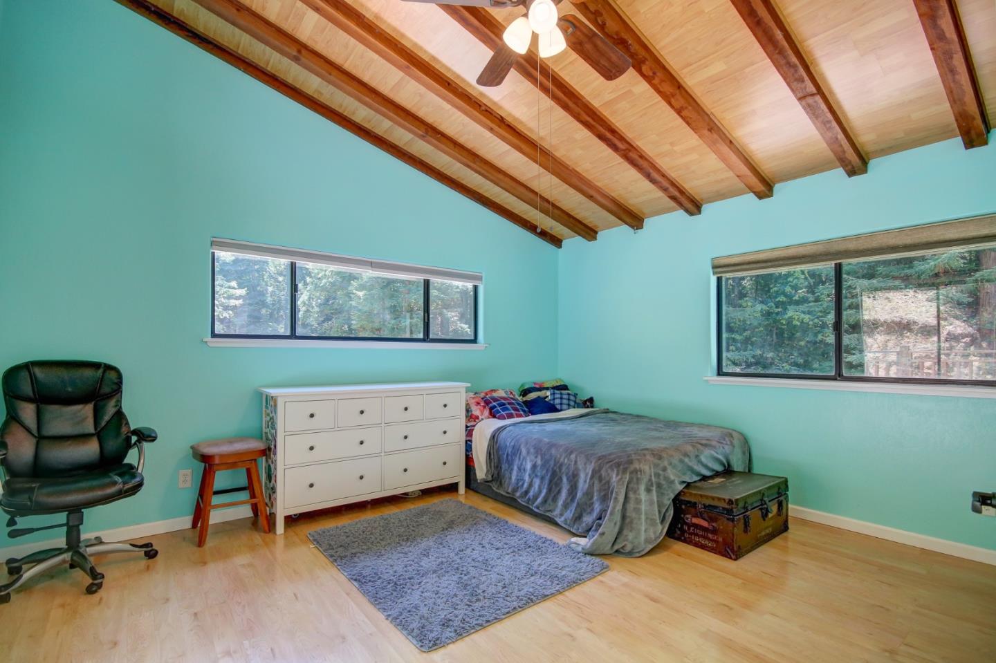 500 Hidden Canyon Watsonville, CA 95076 - Photo 24 of 37 a bedroom with a bed and a chair