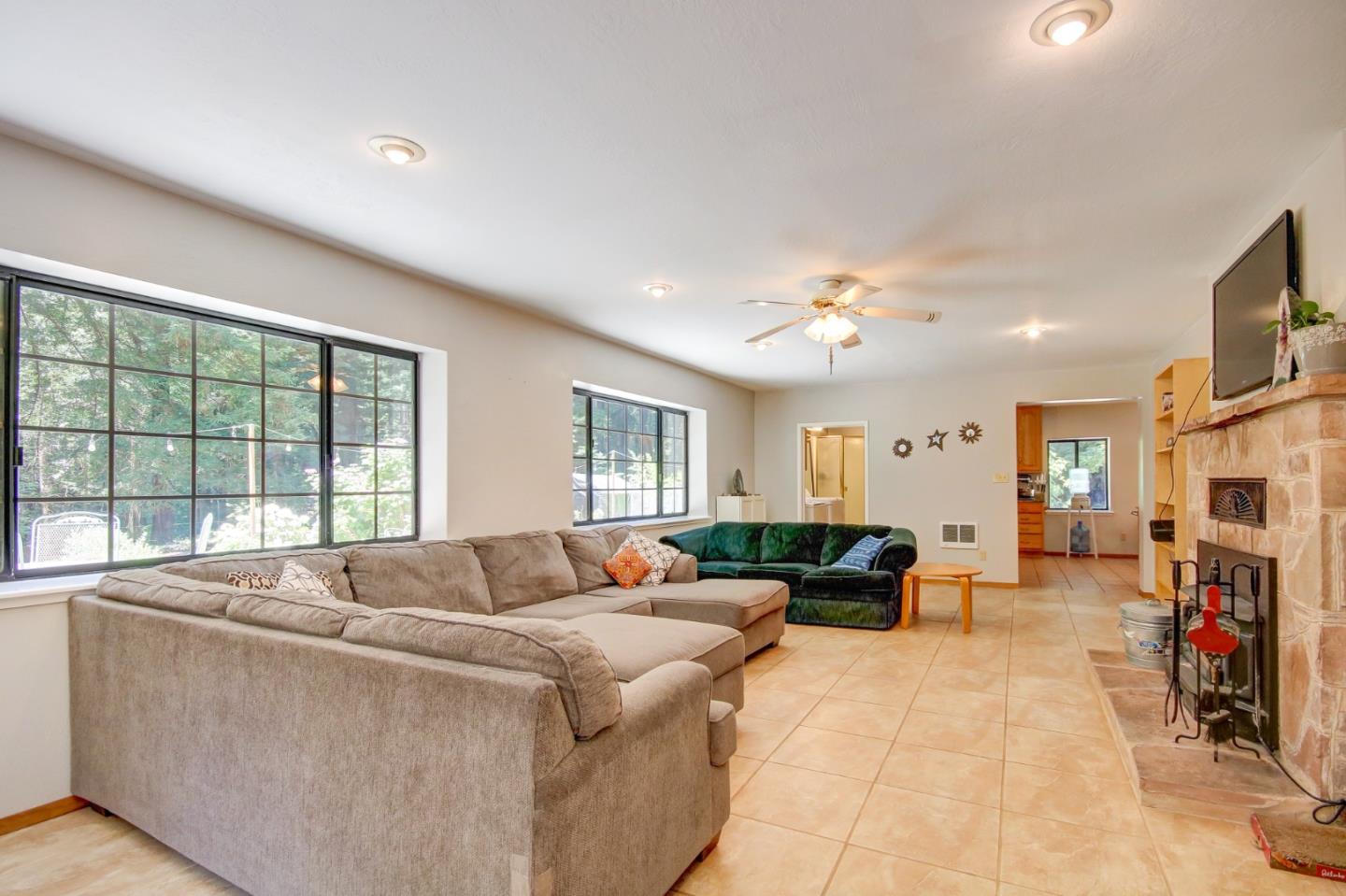 500 Hidden Canyon Watsonville, CA 95076 - Photo 3 of 37 a living room with furniture and a large window