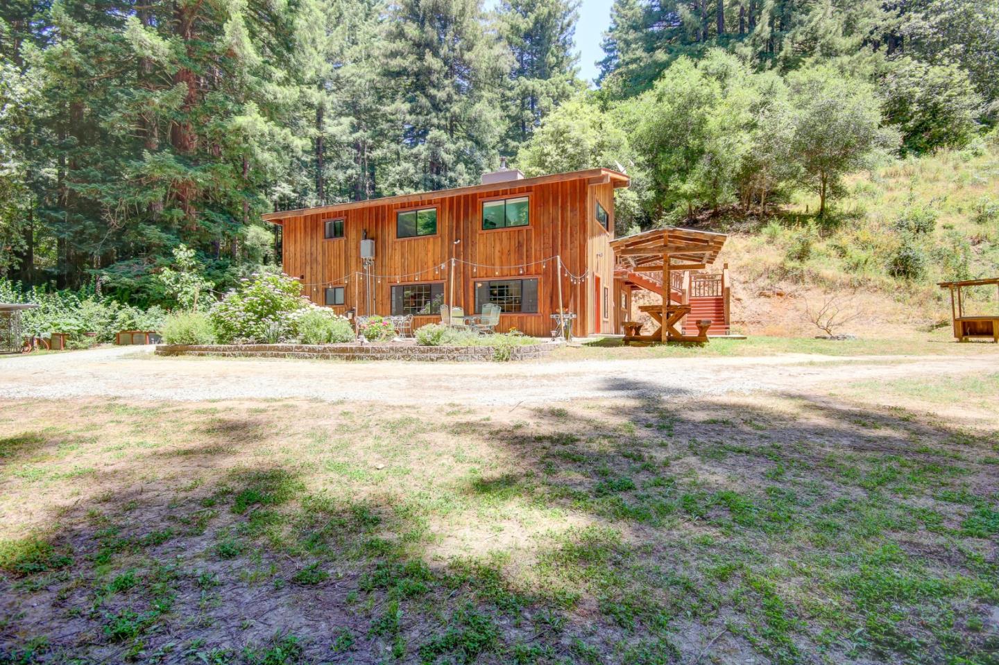 500 Hidden Canyon Watsonville, CA 95076 - Photo 32 of 37 a view of a house with backyard and trees