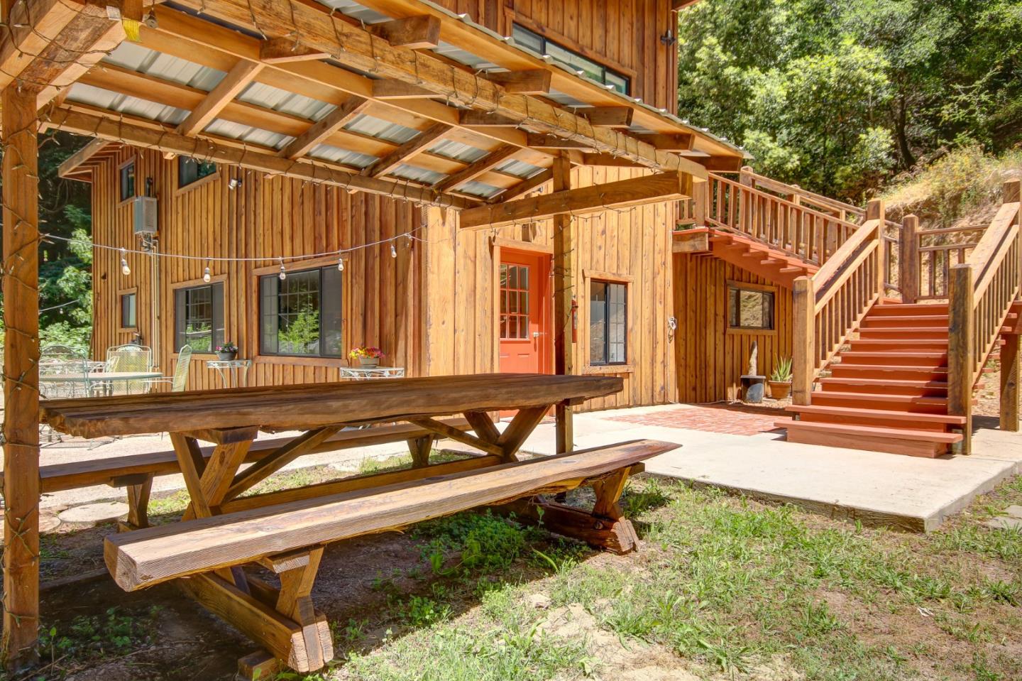 500 Hidden Canyon Watsonville, CA 95076 - Photo 7 of 37 a view of a house with backyard and wooden fence