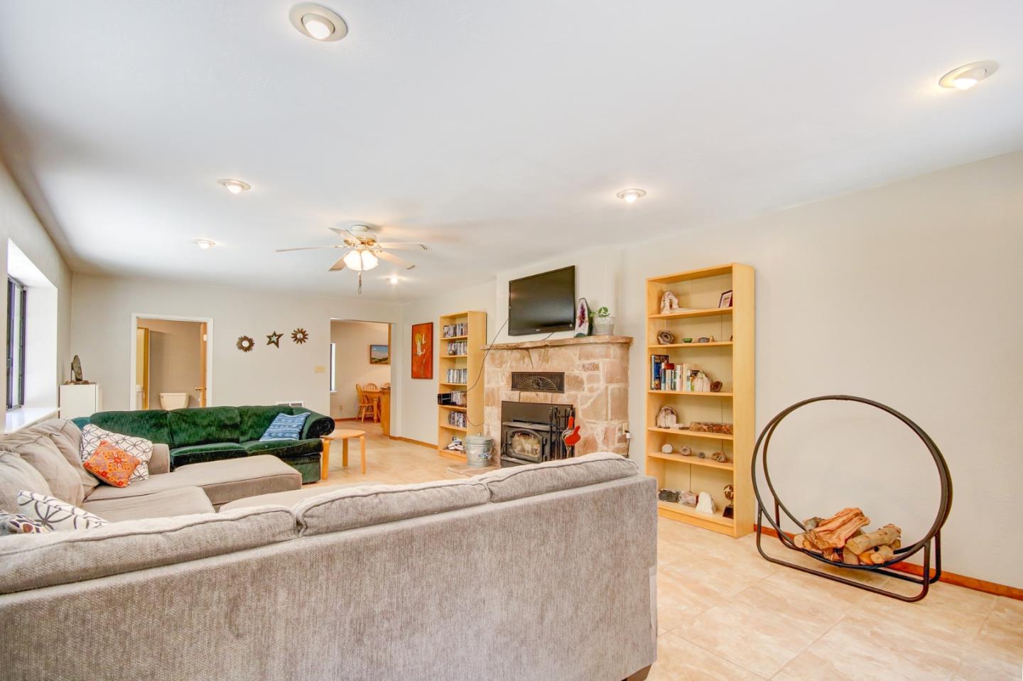 500 Hidden Canyon Watsonville, CA 95076 - Photo 9 of 37 a living room with furniture and a fireplace